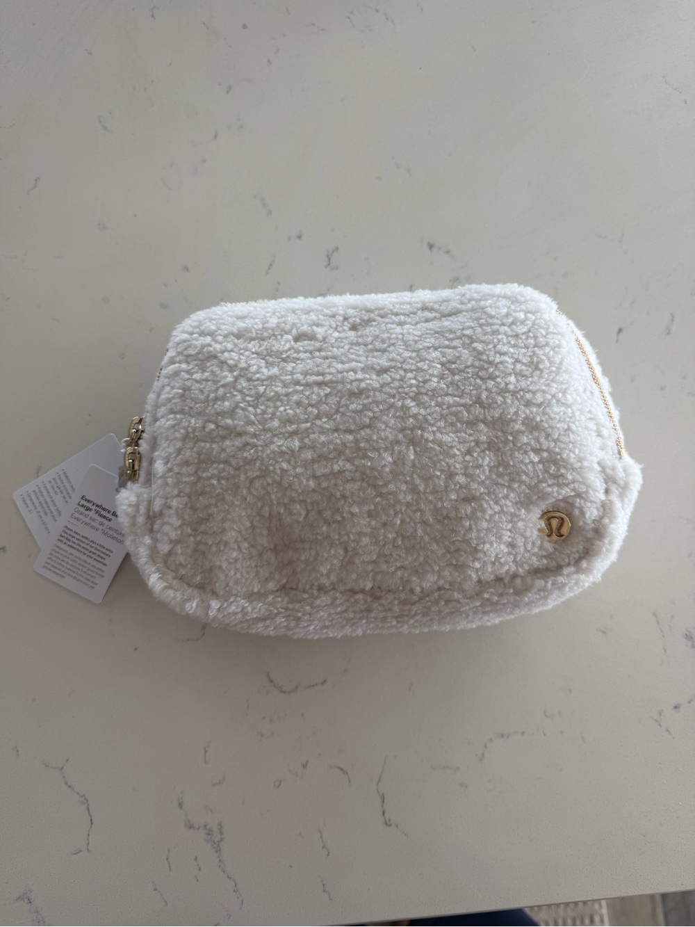 New lululemon athletica Cream Sherpa Pouch with Gold Accents